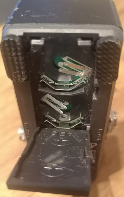 Korg Pitchblack Mini tuner battery compartment (2x CR2032)